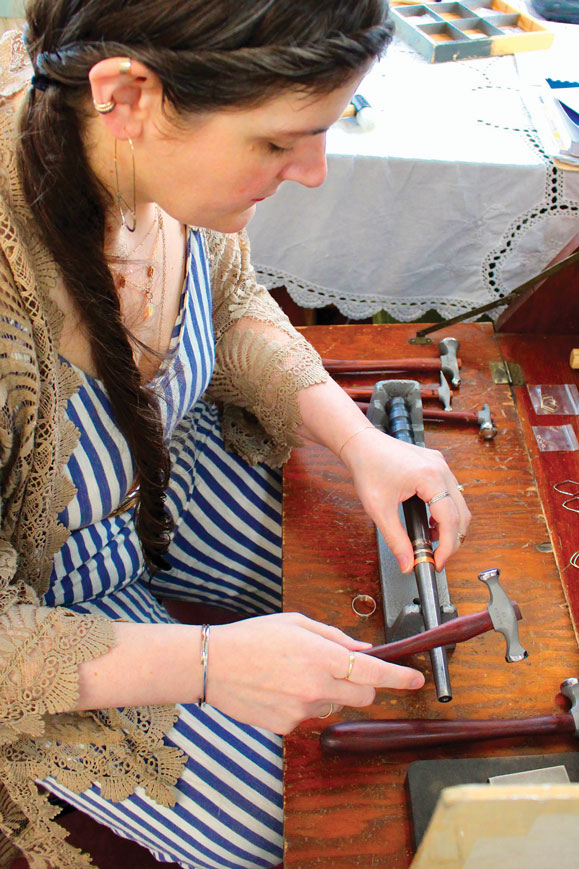 jeweler Alexa Allamano working on a piece of jewelry