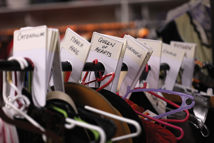An array of clothing tags for theatre performance