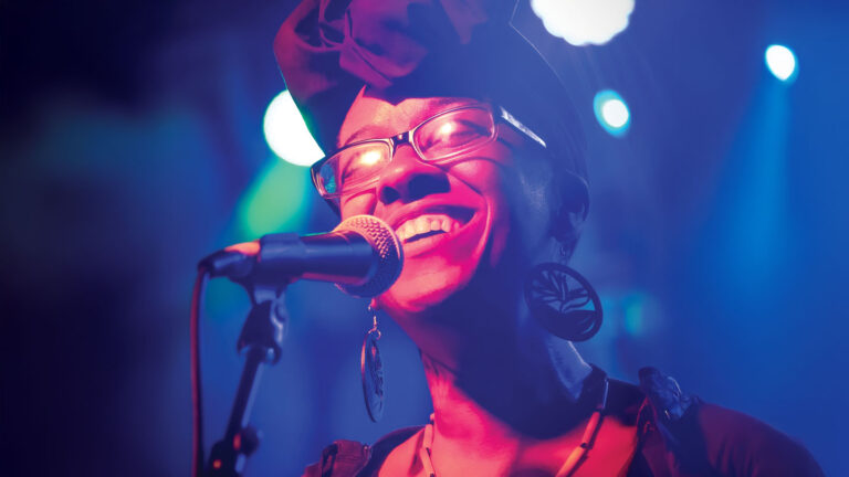 performer signing into a microphone at Little Big Fest